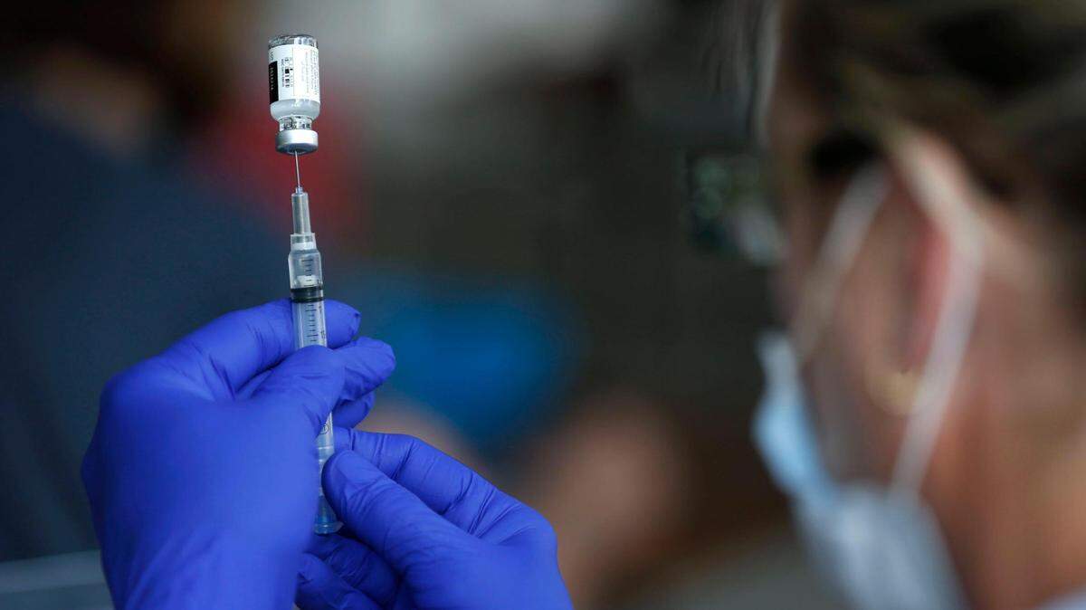 A nurse drew a syringe of the Johnson & Johnson COVID-19 vaccine at a clinic in Springfield in June. The southwest Missouri city has been hard hit by the recent rise in cases driven by the delta variant.
