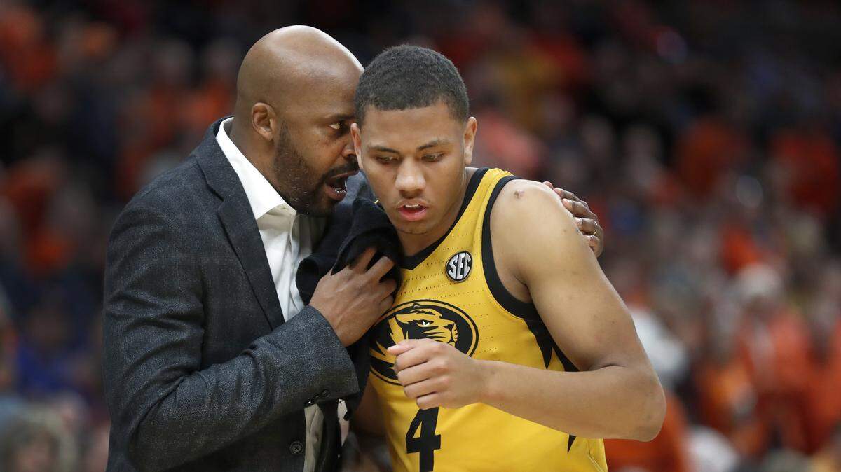 Missouri coach Cuonzo Martin, left, speaks to Missouri’s Javon Pickett during the second half of an NCAA college basketball game against Illinois on Saturday, Dec. 22, 2018, in St. Louis. Missouri won 79-63. (AP Photo/Jeff Roberson)