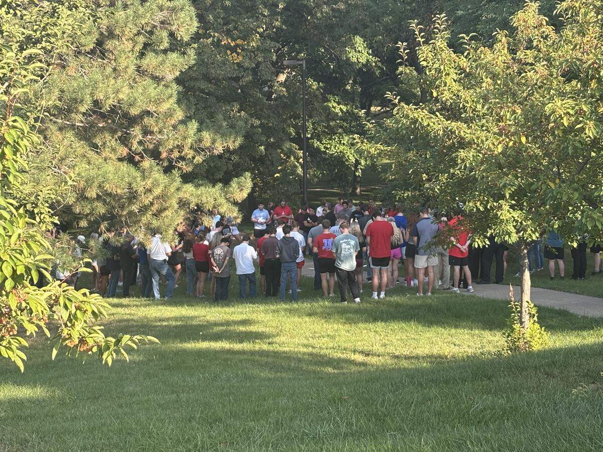 Dozens of University of Kansas students and community members gathered near the university’s memorial Campanile Thursday for a candlelight vigil honoring slain President Donald Trump ally Charlie Kirk.