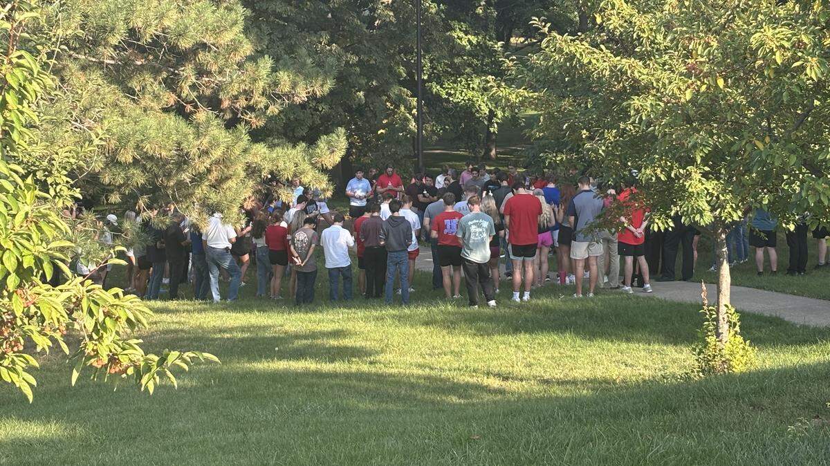Dozens of University of Kansas students and community members gathered near the university’s memorial Campanile Thursday for a candlelight vigil honoring slain President Donald Trump ally Charlie Kirk.