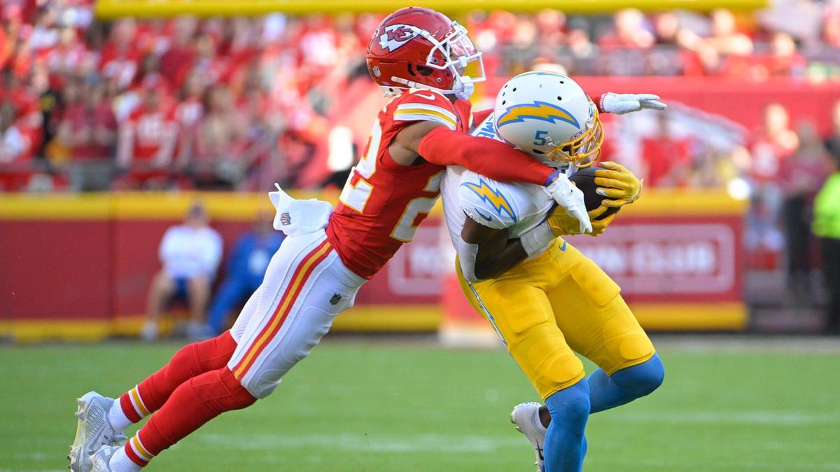 Chiefs cornerback Trent McDuffie tackles Chargers wide receiver Joshua Palmer during an Oct. 22 game at GEHA Field at Arrowhead Stadium.