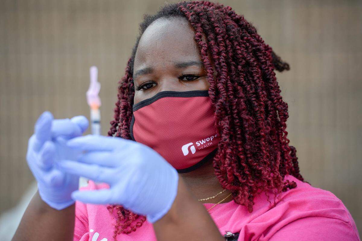 Jalyssa Marshall, medical assistant with Swope Health, worked a COVID-19 vaccine clinic in July. The staff has led more than 250 community vaccination events.