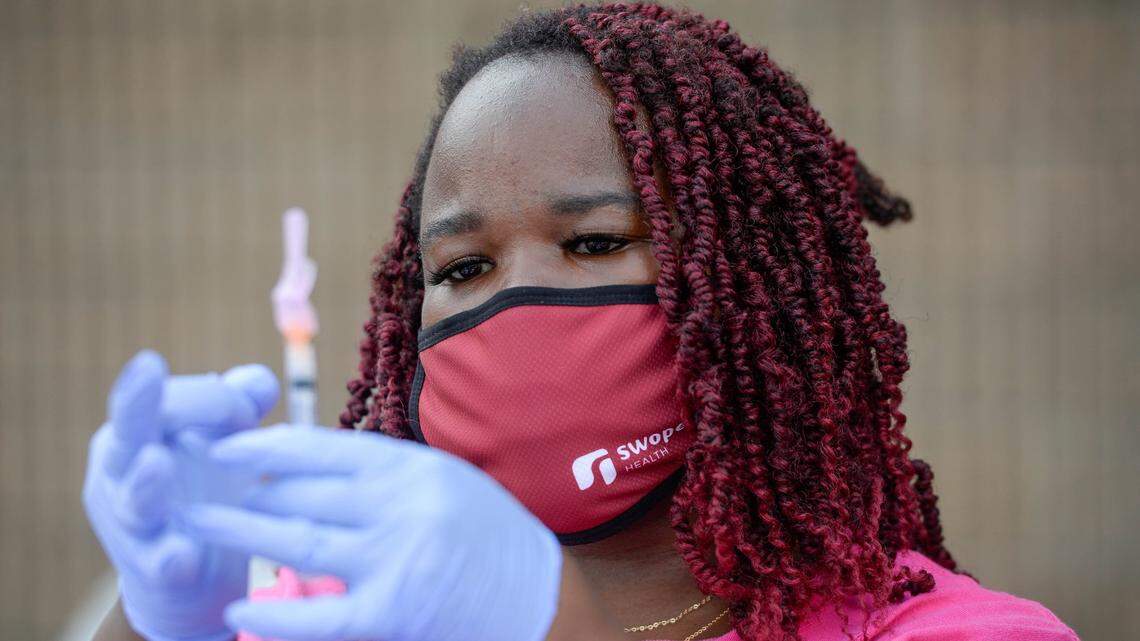Jalyssa Marshall, medical assistant with Swope Health, worked a COVID-19 vaccine clinic in July. The staff has led more than 250 community vaccination events.