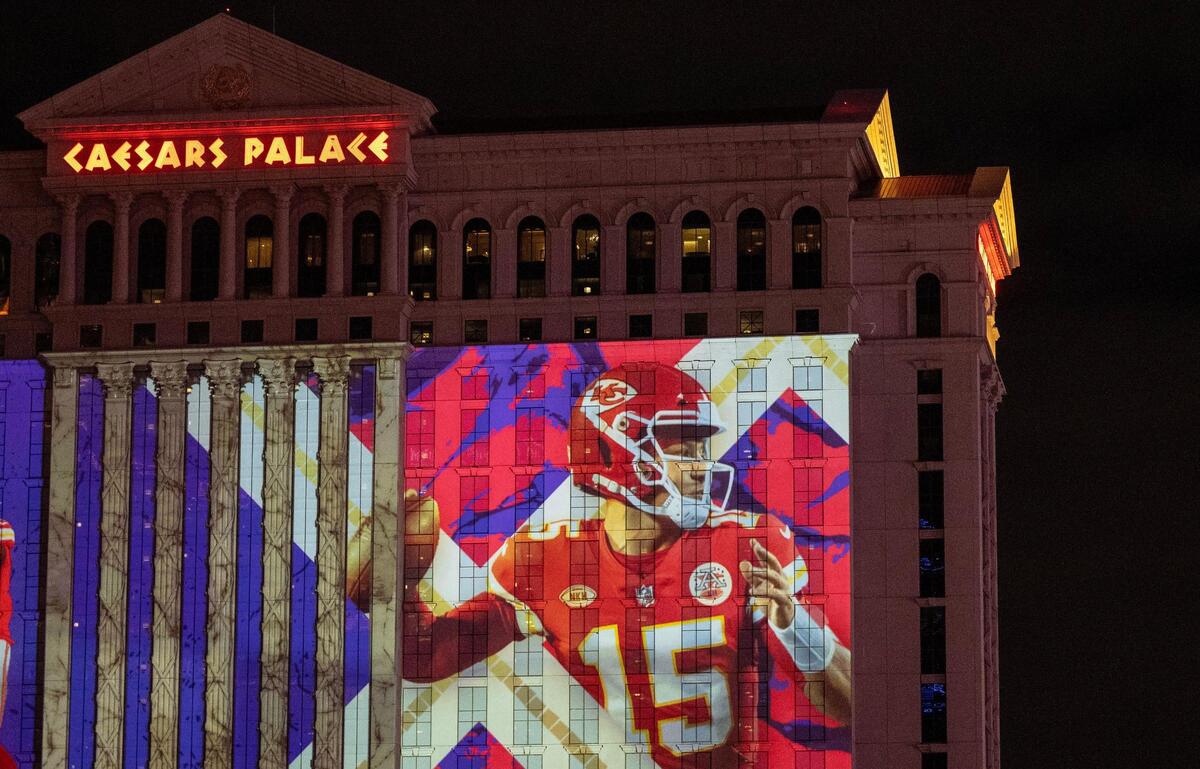 Super Bowl-themed murals were projected on the side of Caesars Palace on Thursday, Feb. 8, 2024, in Las Vegas, Nevada.