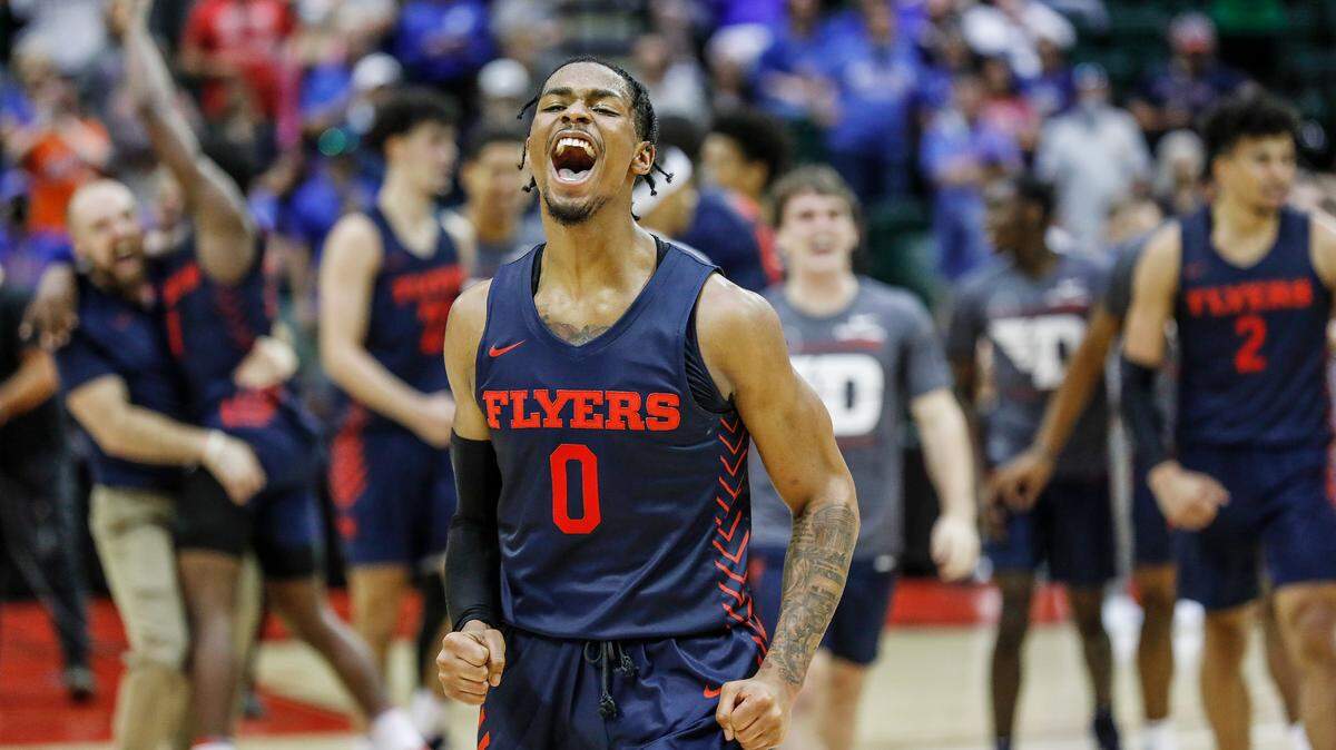 Dayton guard Elijah Weaver celebrates the Flyers’ win over Kansas in the ESPN Events Invitational on Friday.