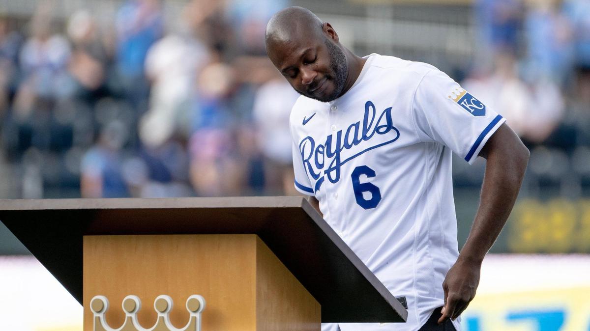 Former Kansas City Royals center fielder Lorenzo Cain cries as he speaks during a retirement ceremony at Kauffman Stadium on Saturday, May 6, 2023, in Kansas City. Cain signed a ceremonial one-day contract to retire as a Royal.