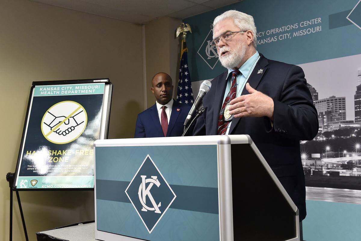 On March 12, when Mayor Quinton Lucas, left, issued a 21-day emergency declaration, Kansas City Health Director Rex Archer said there had not yet been a case of the coronavirus passed from person to person within the metropolitan area. That would soon change.