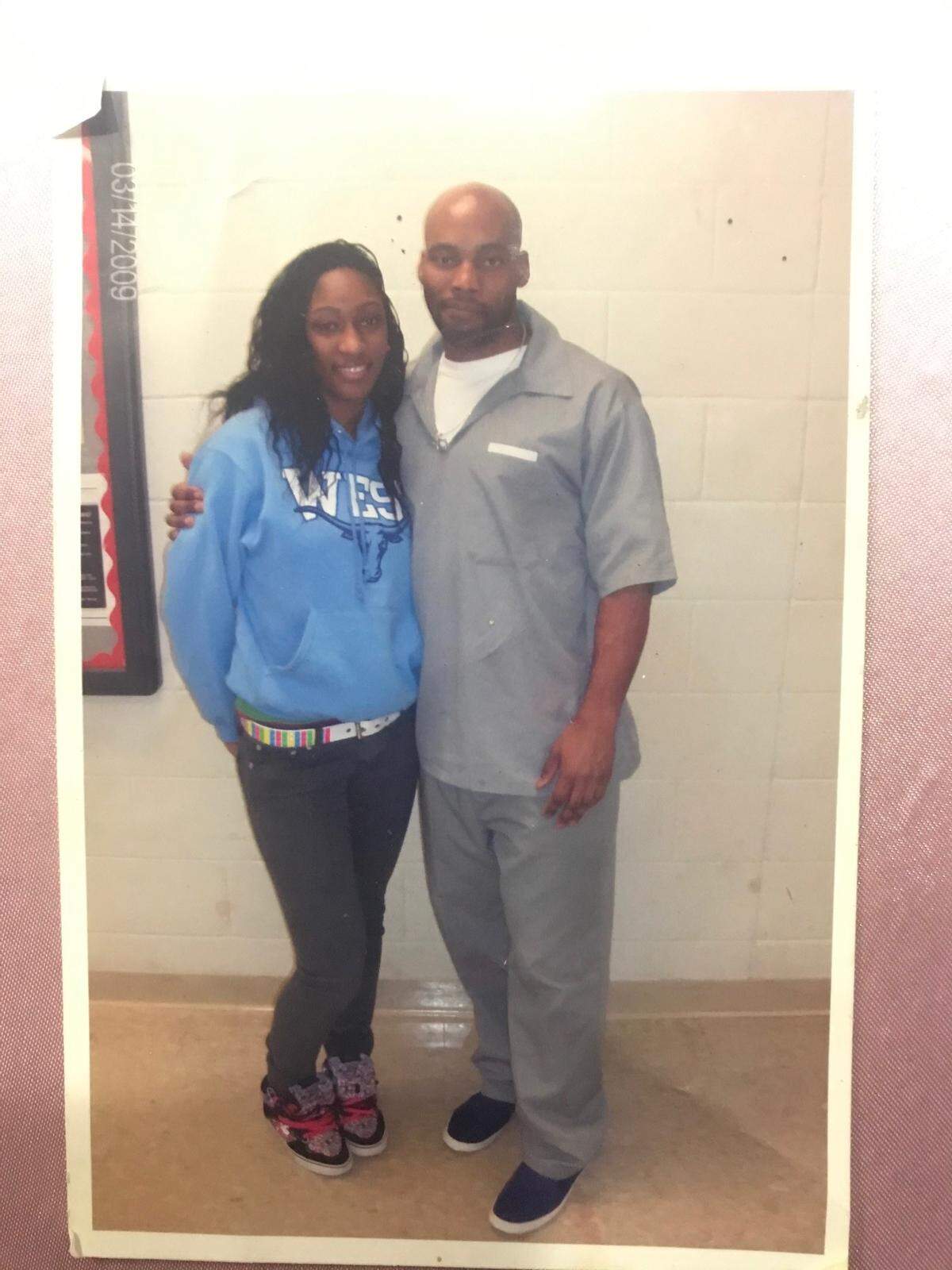 Lamar Johnson poses for a picture with one of his daughters, Kiera Johnson, from inside a Missouri prison. She was a baby when Johnson was convicted of a murder that St. Louis’ top prosecutor now says he did not commit.