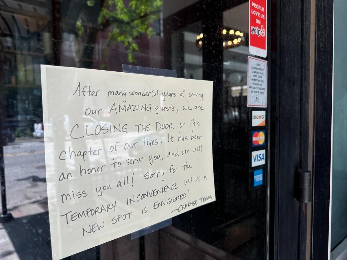 A sign posted to the door at Charisse informs customers of its closure Thursday.