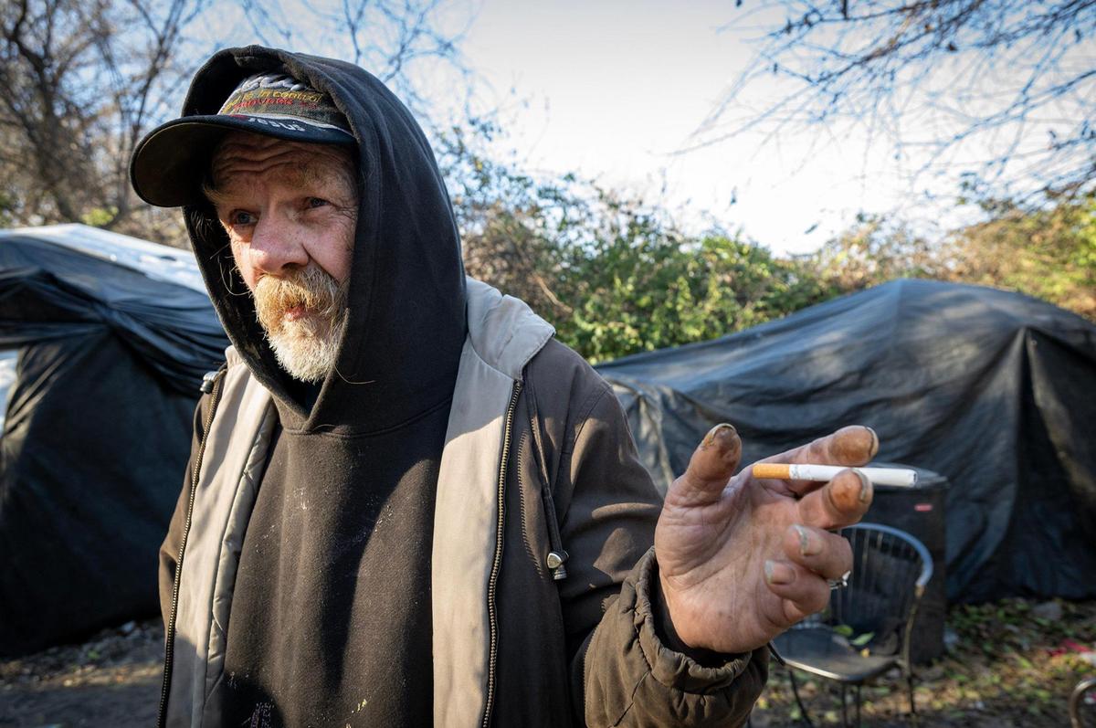 Bill, 67, has been homeless and living outside in Kansas City for some 15 years. ”They call this ‘killer alley,’” he says of the string of homeless camps that run through the woods north of the Columbus Park neighborhood.