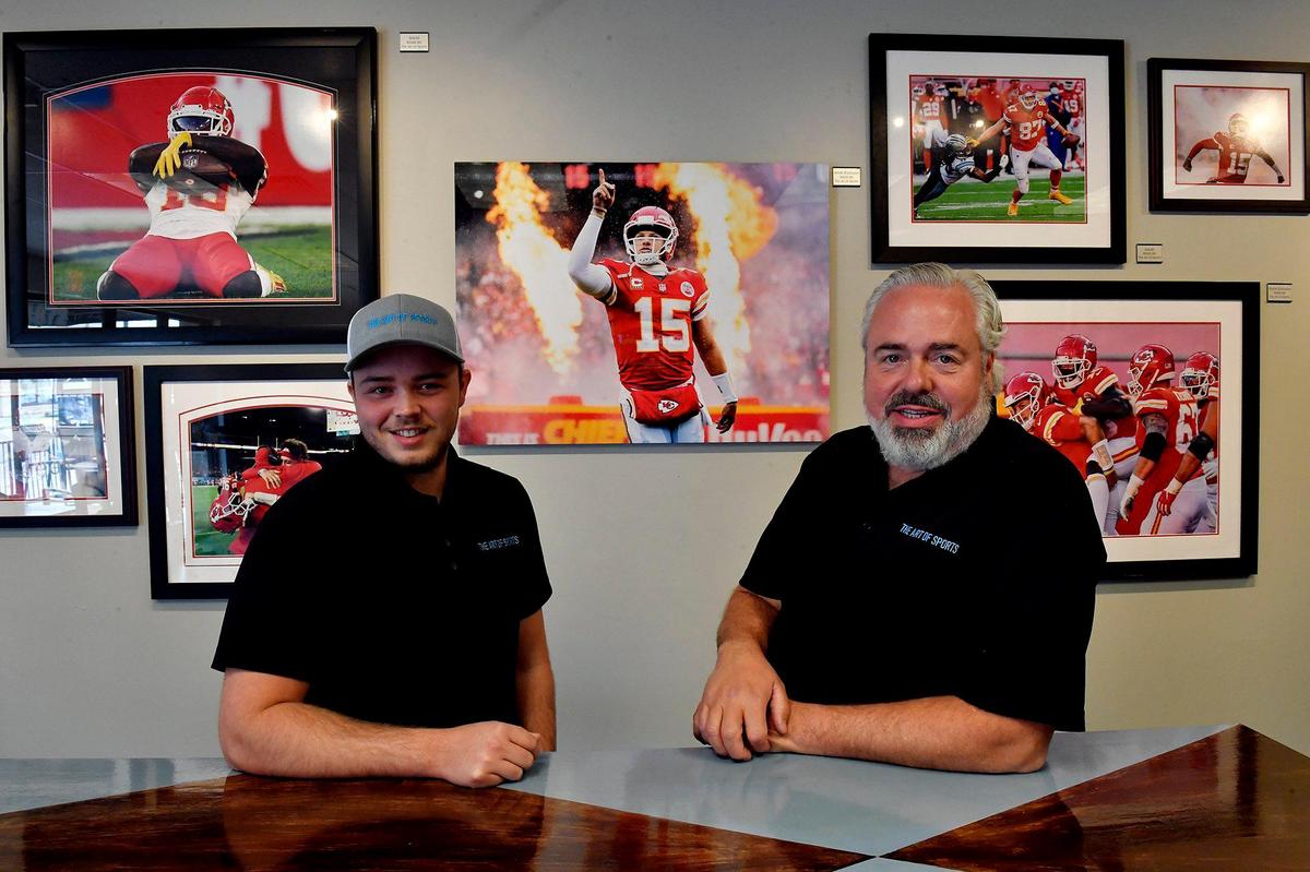 Tyler Gratwick, left, and his father, Trey Gratwick, recently opened The Art of Sports in Town Center Plaza in Leawood.