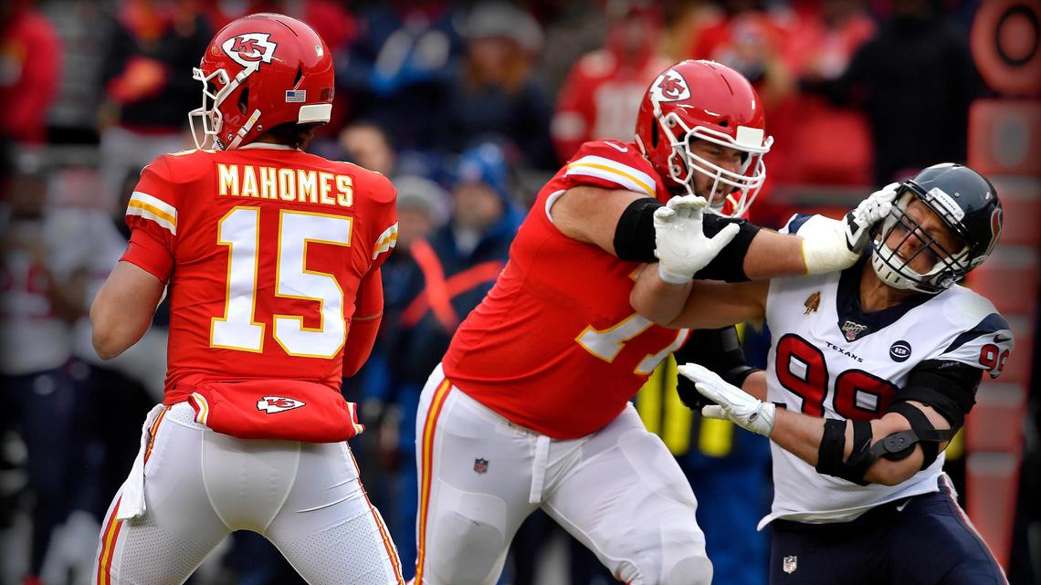 Chiefs quarterback Patrick Mahomes fades back to pass as Chiefs lineman Mitchell Schwartz takes care of Houston’s J.J. Watt during the Chiefs 51-31 playoff win in January at Arrowhead Stadium.