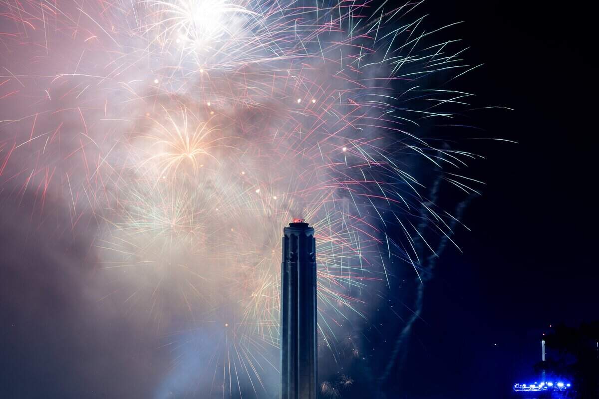 Fireworks light up the night sky over Penn Valley Park on Saturday, July 4, 2026. The National WWI Museum and Memorial's Stars and Stripes Picnic celebrates America's 250th and the Memorial's 100th
