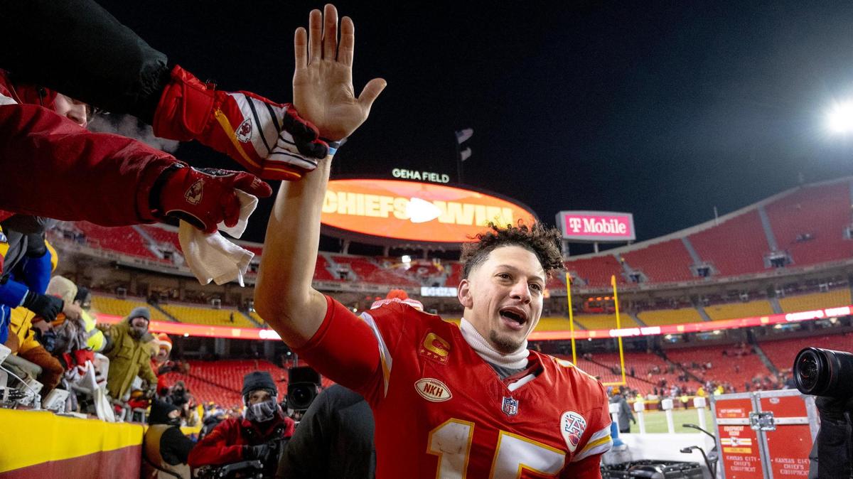 Kansas City Chiefs quarterback Patrick Mahomes (15) celebrates with fans after the Chiefs defeated the Miami Dolphins 26-7 in an AFC Wild Card game at GEHA Field at Arrowhead Stadium on Saturday, Jan. 13, 2024, in Kansas City.