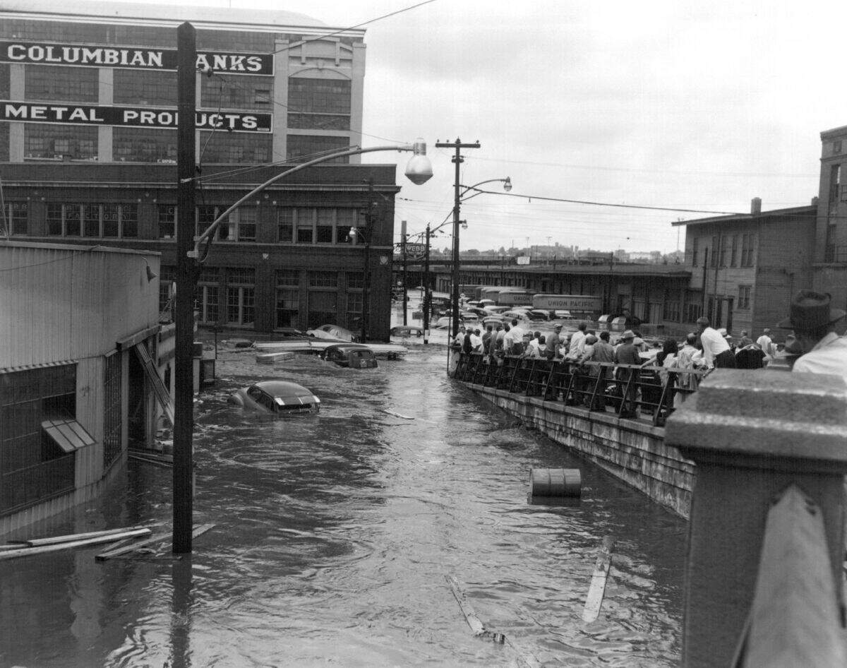 West Bottoms workers gather at the foot of 12th Street Viaduct, July 13, 1951.