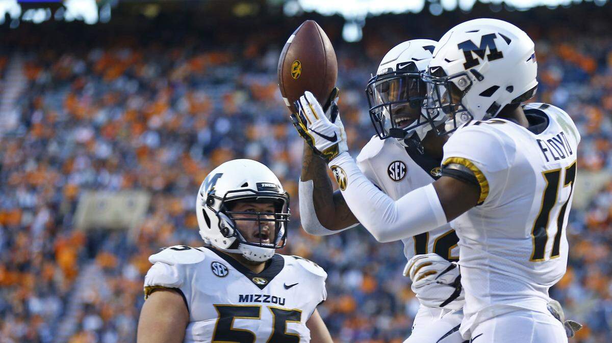 Missouri wide receiver Johnathon Johnson (center) celebrated with Richaud Floyd (right) and Trystan Colon-Castillo (left) after a touchdown in the first half at Tennessee on Saturday.