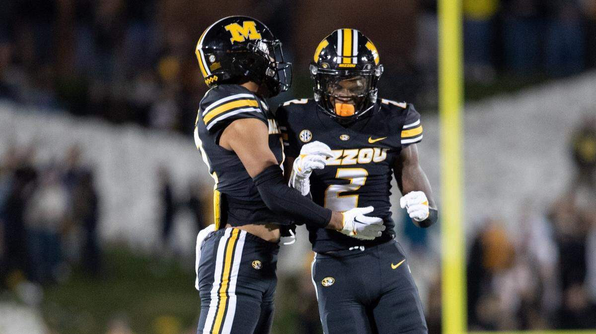Missouri Tigers players celebrate after a missed field goal by Tennessee during last Saturday’s SEC game at Faurot Field.