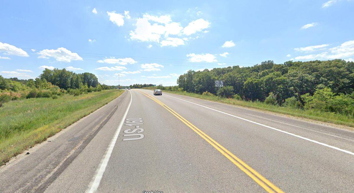 A suspect in the killing of a Christian County deputy during a traffic stop in southern Missouri was killed in a shootout with law enforcement that also killed a second deputy and injured two others near the roundabout on U.S. 160 near Reeds Spring, Missouri. This Google Maps Street View image shows the area in 2023 before the roundabout was built.