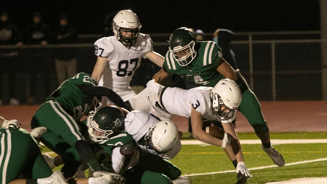 Jacob Hartman, #3, of Mill Valley, dove in for the touchdown in the fourth quarter of the game against DeSoto Friday, November 13, 2020, bringing the score to Mill Valley 10, DeSoto 6.