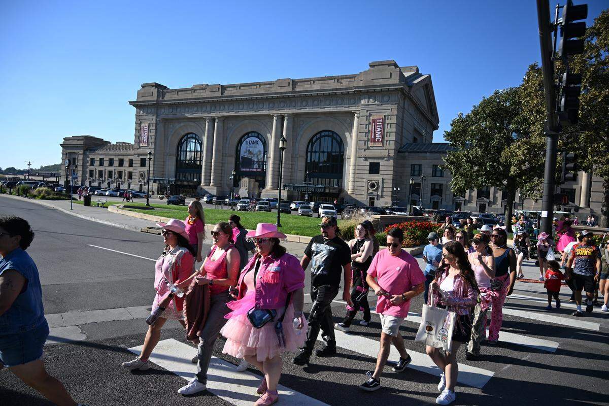 Fans walk by Union Station n their way to the Chappell Roan concert on Saturday, Oct. 4, 2025, at the National WWI Museum and Memorial in Kansas City.