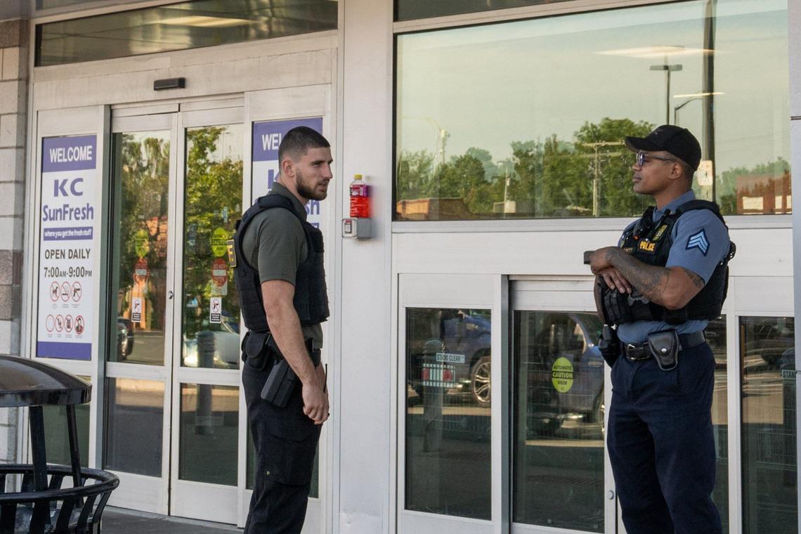 Police and security officers stand at the entrance of the SunFresh Market at the Linwood Shopping Center in September 2024. Due to reports of crime and vagrancy, the shopping center has increased security and police presence.