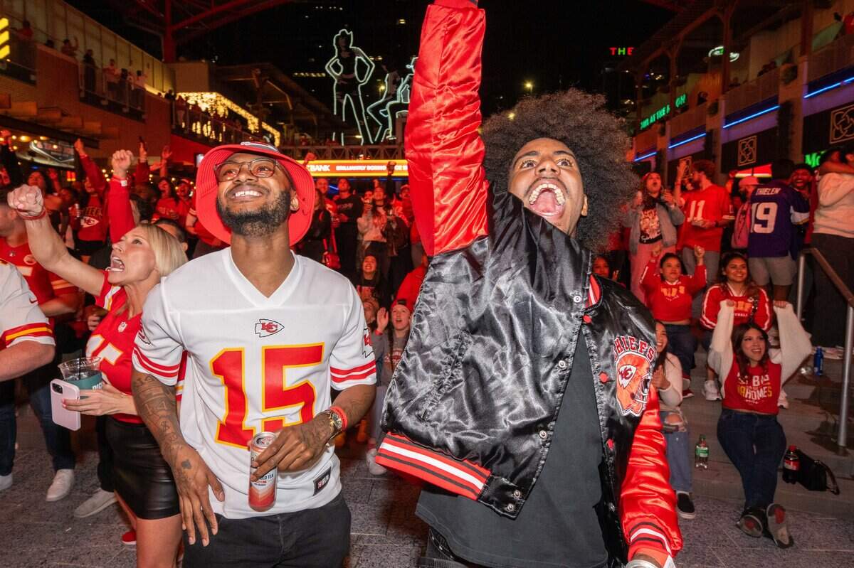 Fans scream in excitement after a touchdown in the Chiefs season opening game vs. the Los Angeles Chargers, at the KC Live! watch party on Friday, Sep. 5, 2025, in Kansas City Power & Light.