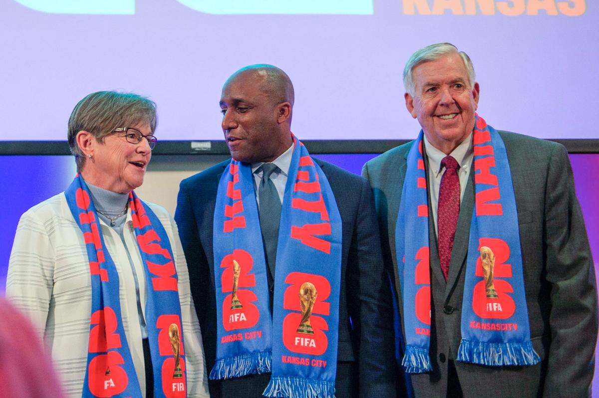 Alongside Kansas Governor Laura Kelly and Missouri Governor Mike Parson, right, Kansas City Mayor Quinton Lucas spoke about the importance of welcoming immigrants at a news conference last year regarding FIFA World Cup 2026 games in Kansas City.