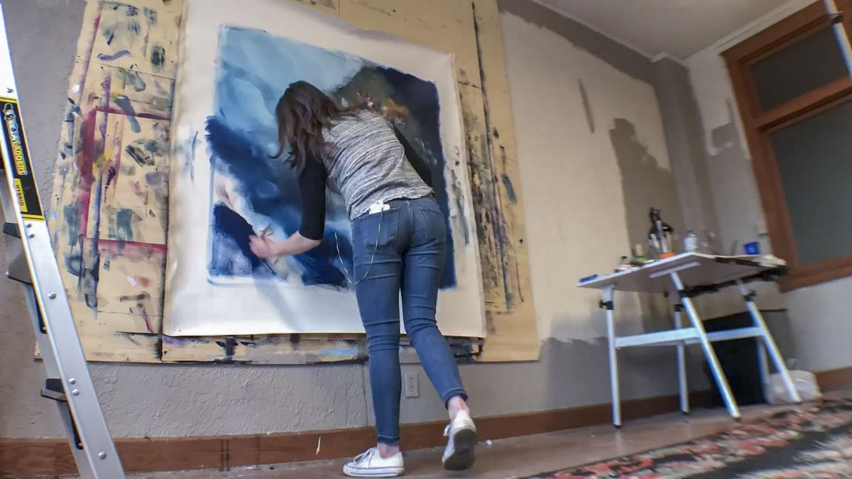Melissa McCracken says her working process generally starts in her car, where she’ll hear a song that provokes an image and then she'll go straight to her studio to paint it on a canvas.