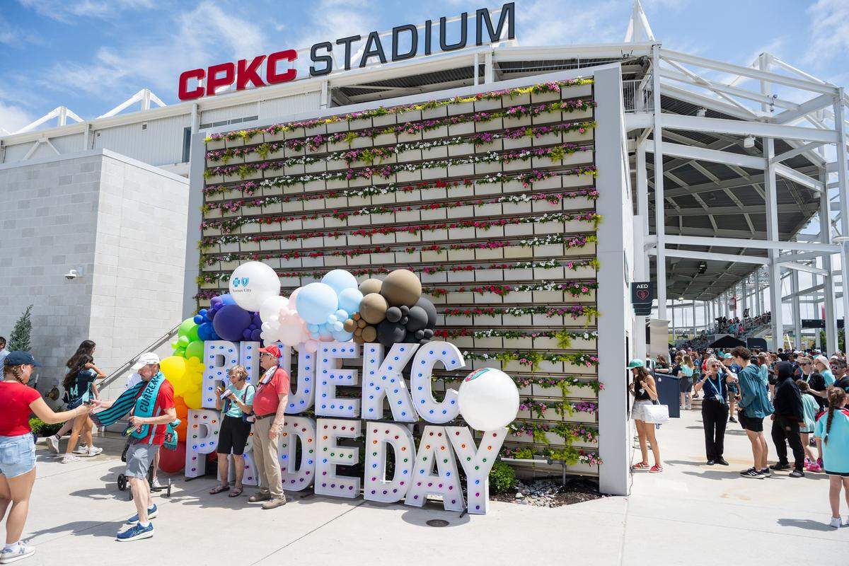 Fans take a photograph in front of a display prior to Kansas City Current's match vs. Boston Legacy FC on Saturday, May 30, 2026, at CPKC Stadium.