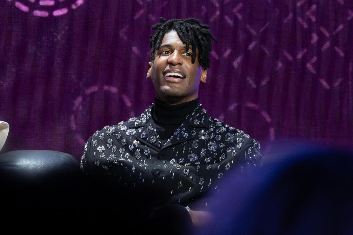 Composer Jon Batiste takes questions from a moderated interview during a press conference on Thursday, Feb. 6, 2025, in New Orleans. Batiste will take the field to perform the national anthem during Super Bowl LIX.