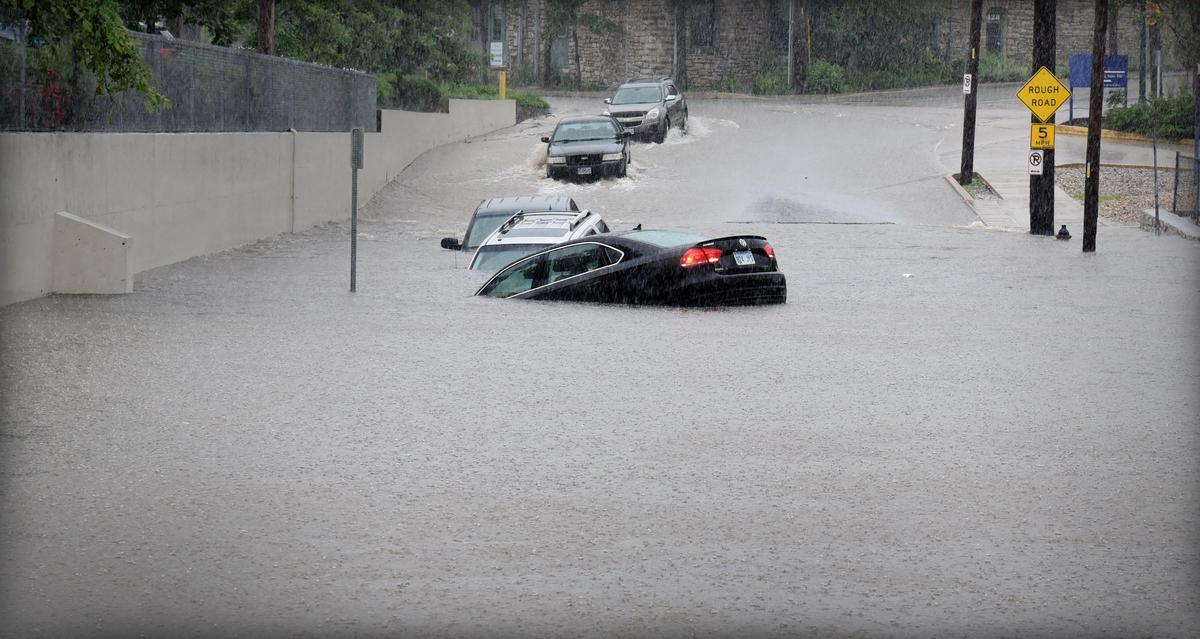 Heavy rains Thursday caused areas of flash flooding throughout the Kansas City metro area. These cars were swept away on the southeast side of Westport.