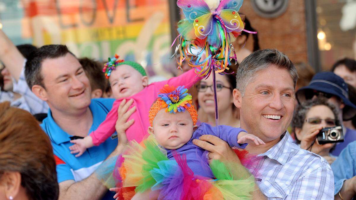 In 2013, Timothy Stephenson, right, and his husband, Jospeh Ginejko, held their 6-month-old twin daughters while watching San Francisco’s Gay Pride parade. Stephenson was charged earlier this year with second-degree murder.