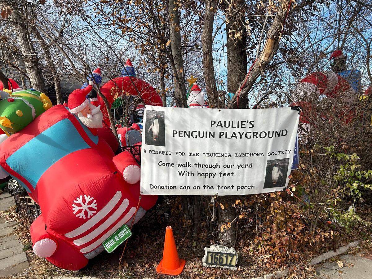 A sign welcomes visitors to Paulie’s Penguin Playground in Olathe.