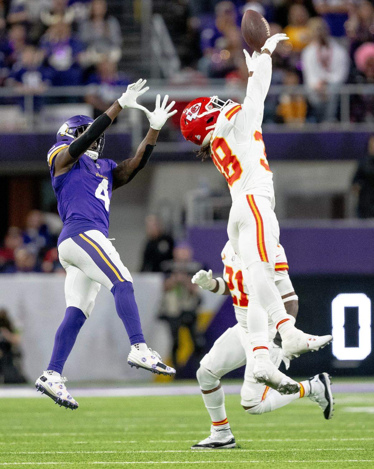 Kansas City Chiefs cornerback L’Jarius Sneed (38) breaks up a pass intended for Minnesota Vikings wide receiver Brandon Powell (4) during an NFL football game on Sunday, Oct. 8, 2023, at U.S. Bank Stadium in Minneapolis, Minn.