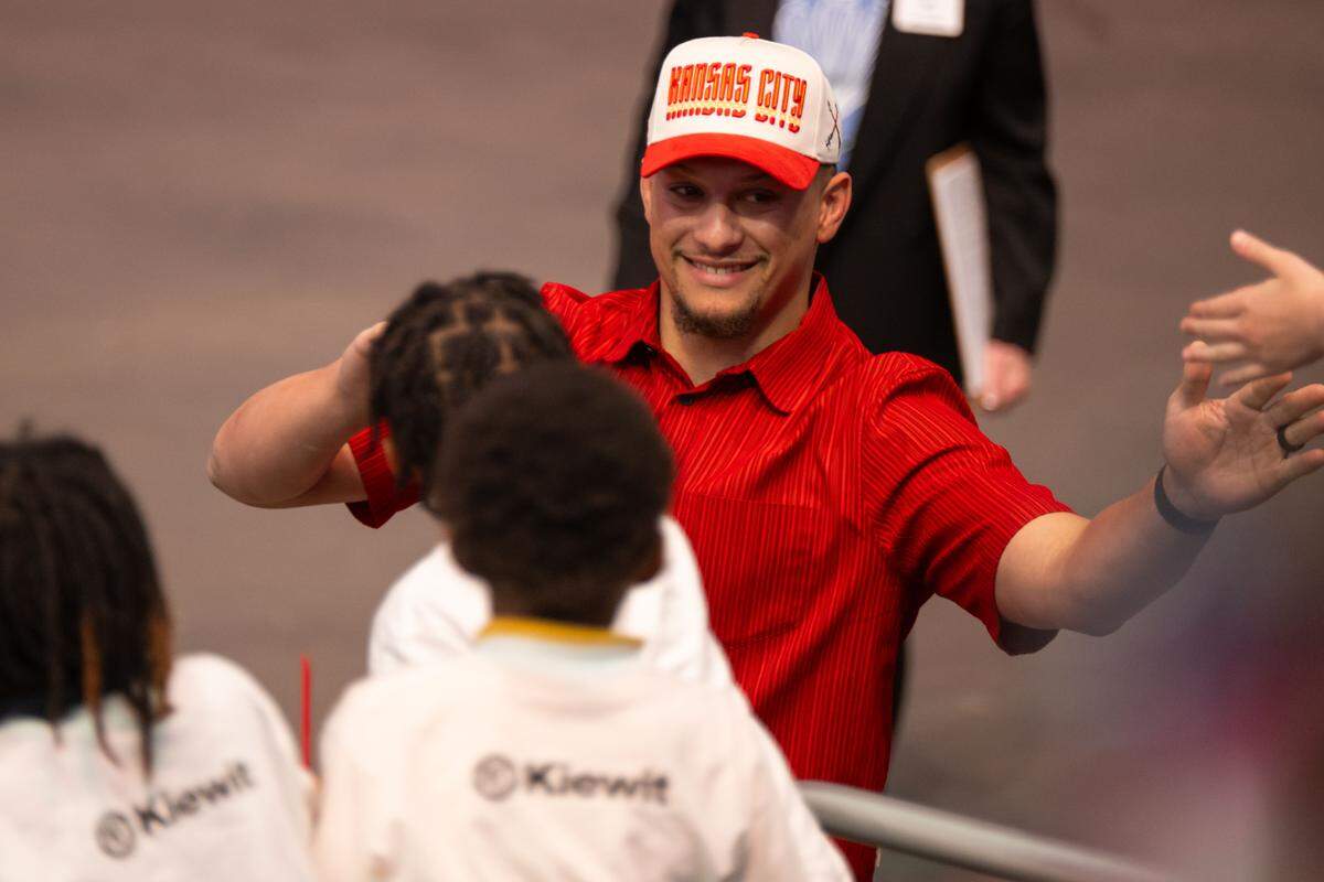 Kansas City Chiefs quarterback Patrick Mahomes greets thousands of grade school kids from around the Kansas City metro before reading to them at the Lead to Read KC Reading Rally, on Thursday, April 2, 2026, at T-Mobile Center.