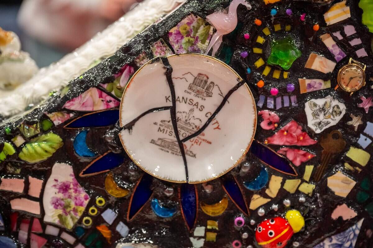 Details from Miranda Pietzsch's heart titled “bits & pieces” during the first public exhibition of the new Parade of Hearts sculptures on Saturday, April 4, 2026, in Overland Park. Pietzsch created a mosaic using found pieces from estate sales around the city.