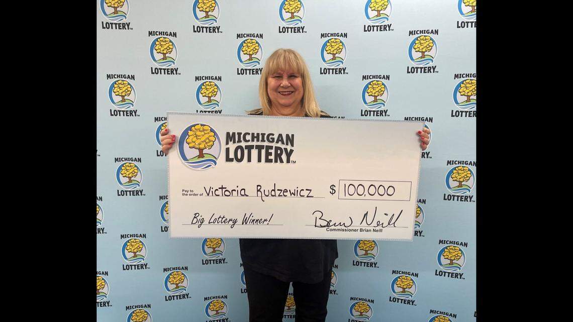 A Michigan woman won the top prize in a Michigan lottery game she didn’t know she was playing.