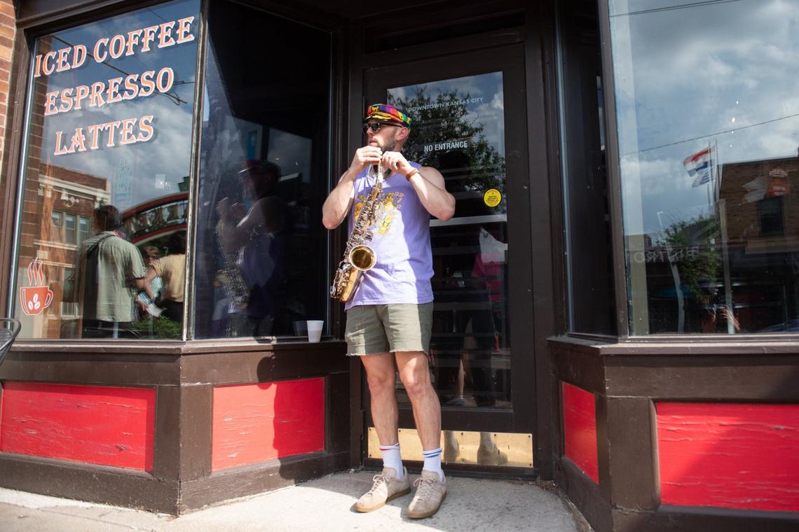 A Sass-A-Brass band member gets ready to peform at the City Market Pride month celebration on Friday, June 21, 2024, in Kansas City.