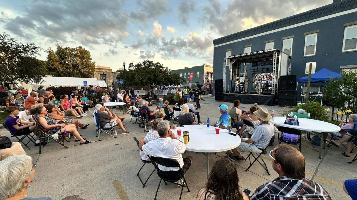 People gather for live music during Excelsior Springs’ annual Waterfest event held each summer.