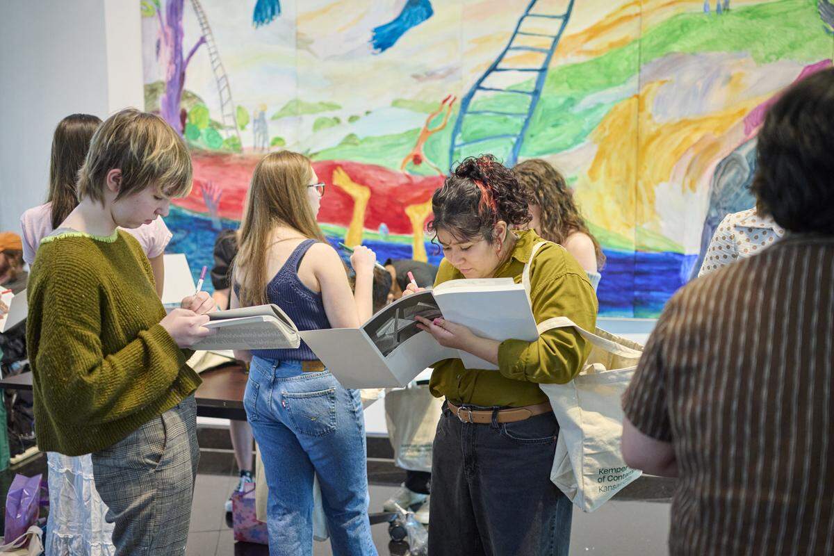 Members of the Teen Arts Council observe works in the Kemper Museum of Contemporary Art. A newly announced $1 million donation will support programs like this.