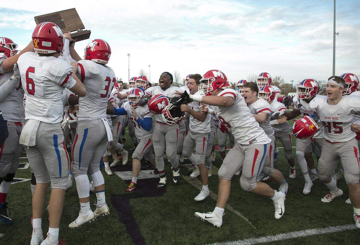 Bishop Miege celebrates its win over Goddard in the Kansas Class 4A championship game Saturday in Topeka.