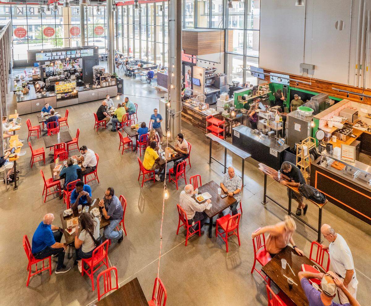 Families eat lunch at Lenexa’s Public Market, which just welcomed a new vendor.