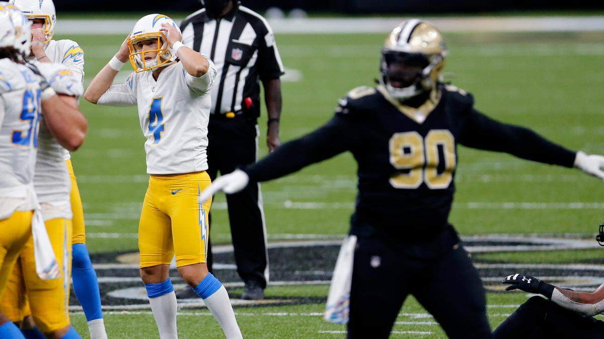 Los Angeles Chargers kicker Mike Badgley (4) reacts after missing a field goal in the second half of an NFL football game against the New Orleans Saints in New Orleans, Monday, Oct. 12, 2020. The Saints won in overtime, 30-27. (AP Photo/Brett Duke)