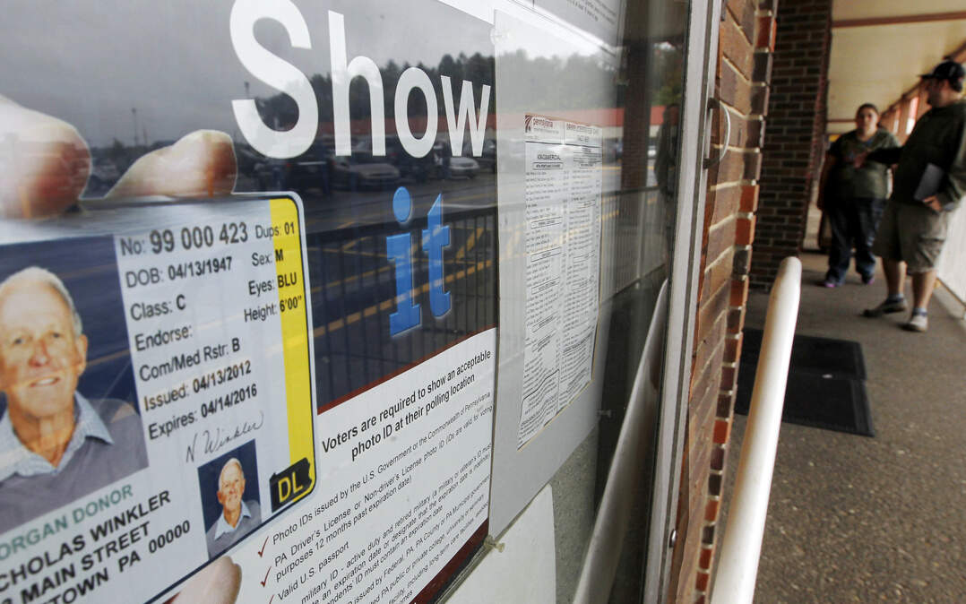 States that require voters to show an acceptable photo ID include Pennsylvania, where this photo was taken, and Kansas. Missouri doesn’t have such a requirement yet, but backers of the idea believe the time is coming soon.