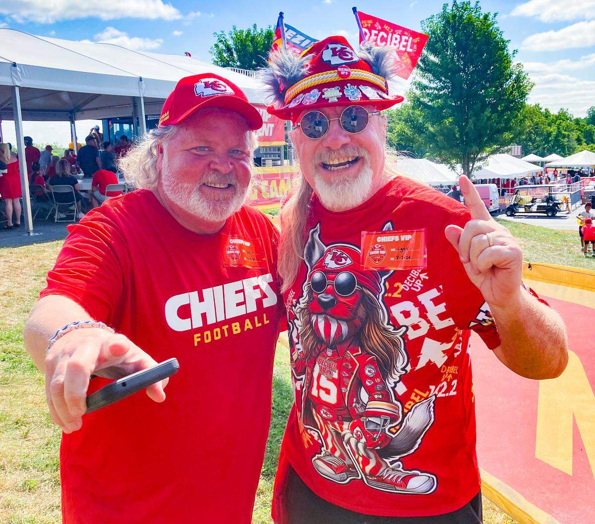 Super fans Lynn “Weirdwolf” Schmidt, left, and friend Bob Green at Chiefs camp.