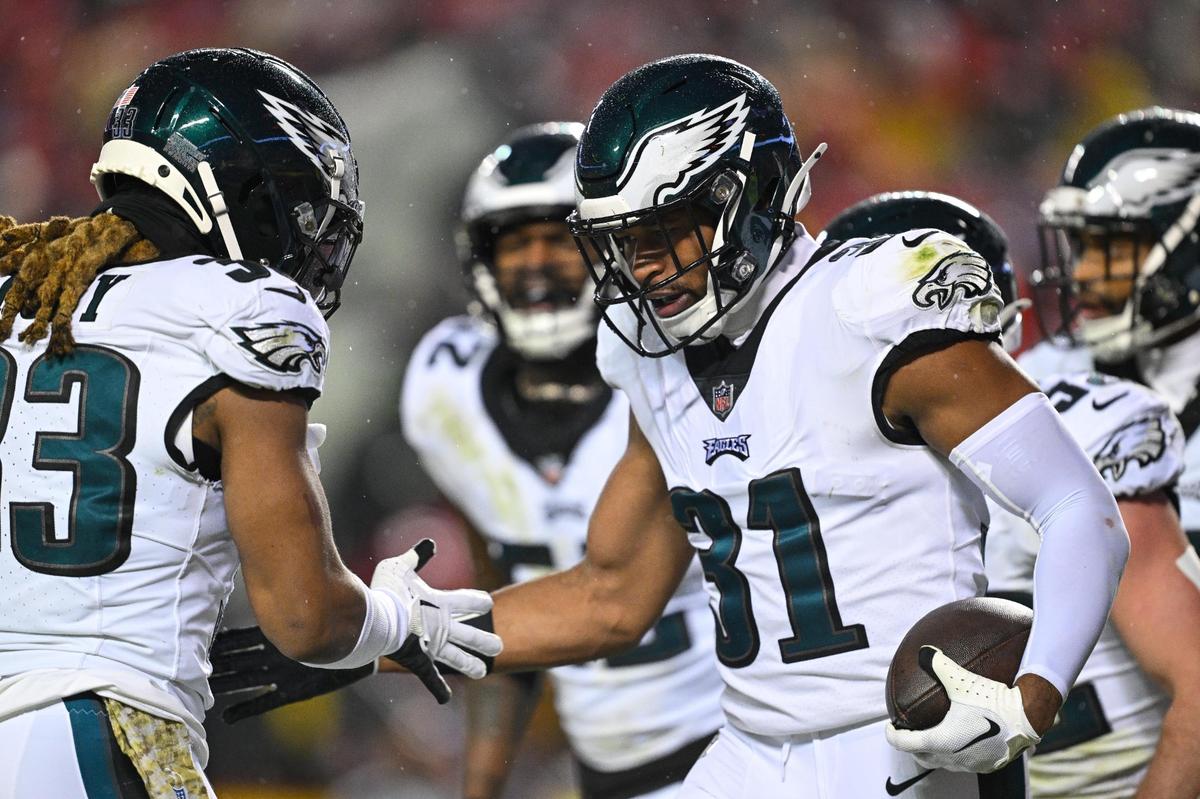 Philadelphia Eagles safety Kevin Byard (31) celebrates with cornerback Bradley Roby (33) after Byard picked off a pass by Kansas City Chiefs quarterback Patrick Mahomes in the Chiefs’ end zone in the first half Monday, Nov. 20, 2023, at GEHA Field at Arrowhead Stadium.