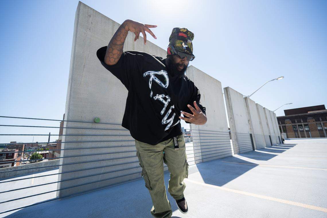 Tyrell Griffin, aka “KonWork,” shows off his moves on top of a parking garage in downtown Kansas City, on Thursday, April 23. Griffin, a Kansas City native, will be competing in the Red Bull Dance Your Style Midwest Regional Qualifier at Kauffman Center of Performing Arts. Griffin’s style is krumping, a battle style of dance that features aggressive, sporadic and high energy movements.