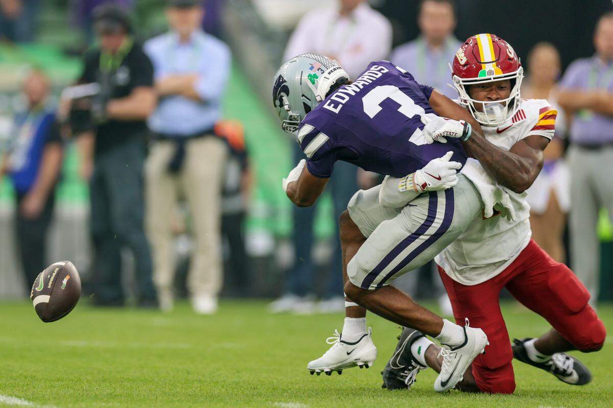 Kansas State running back Dylan Edwards loses the ball during the Aer Lingus Classic between Iowa State and Kansas State at Aviva Stadium in Dublin on Aug. 23, 2025.