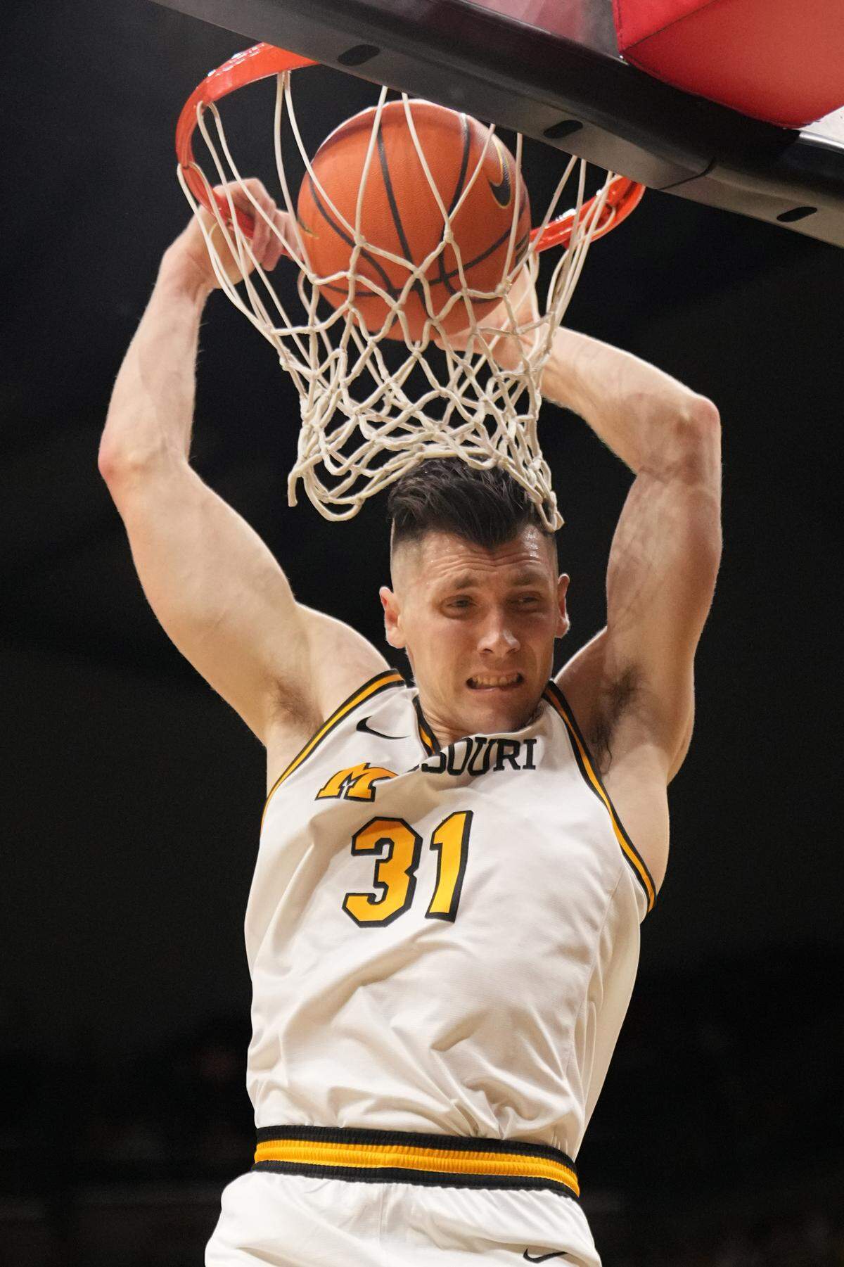 Missouri Tigers guard Caleb Grill (31) dunks the ball against the South Carolina Gamecocks during the first half at Mizzou Arena on Feb. 25, 2025.