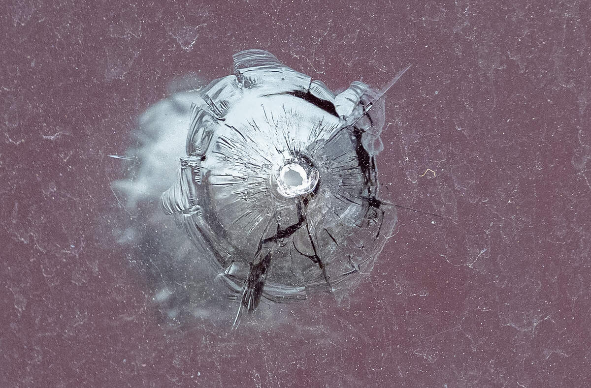 A bullet hole is seen on a window at the scene at 2801 Southwest Blvd. following an early morning shooting on Sunday, Feb. 15, 2026. Two women were killed and two others injured during the incident at a Kansas City nightclub Status.